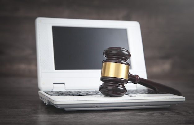 judge-gavel-laptop-keyboard-internet-crime_220873-3027